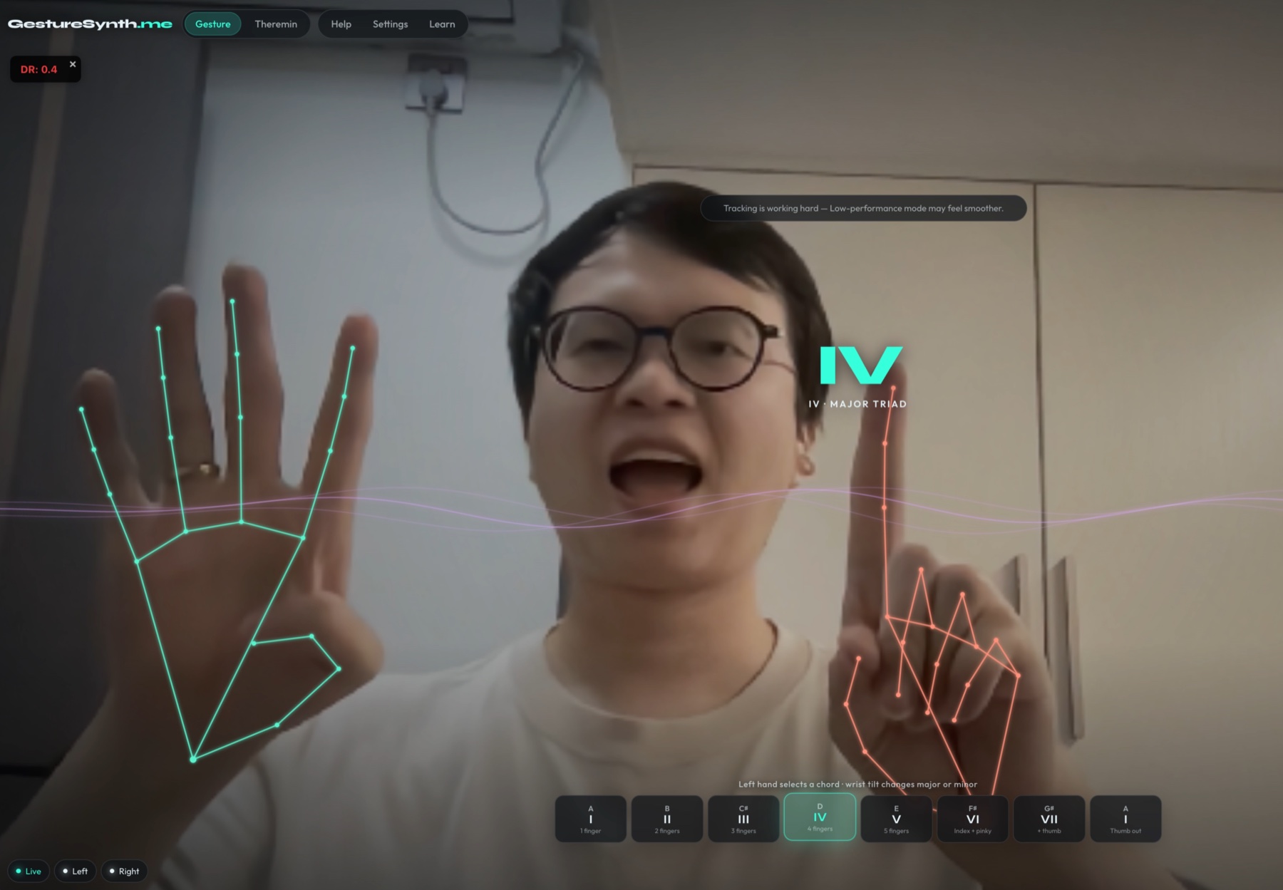 GestureSynth tracking two hands while a musician plays a D major triad